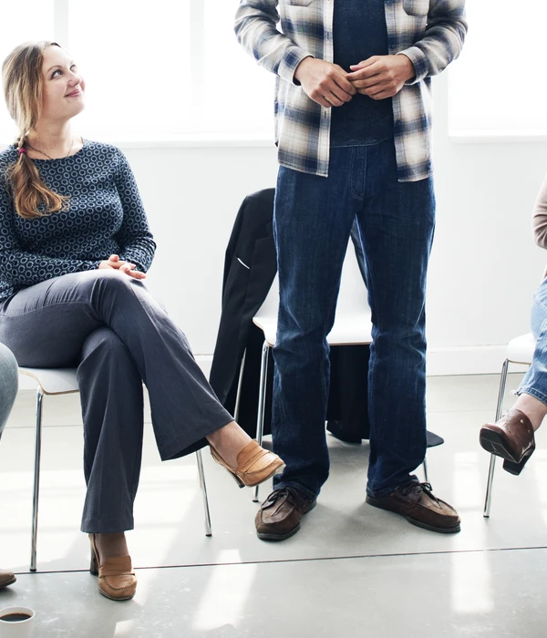 twilight group therapy man standing front people