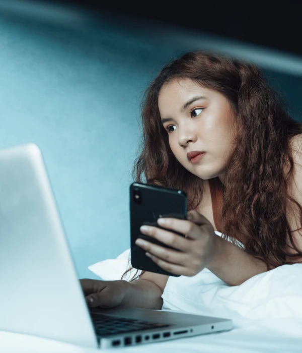 twilight internet addiction woman looking phone while she using