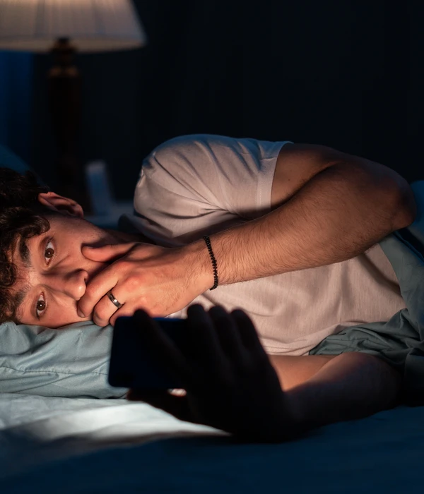 twilight man laying bed hand face sex porn addiction