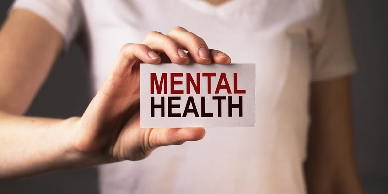 twilight mental health person holding card word pao