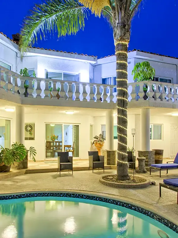 twilight pool palm tree middle house