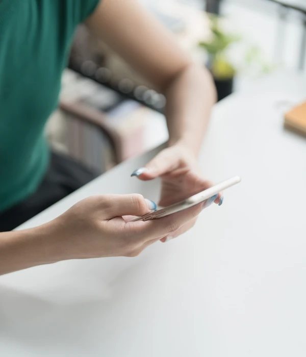 twilight shopping addiction person holding cell phone