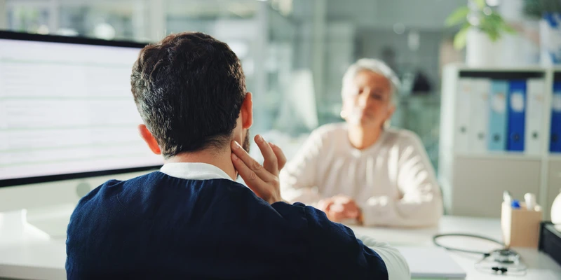 twilight therapy man sitting desk head hands