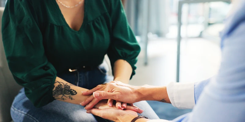 twilight therapy woman holding hand man